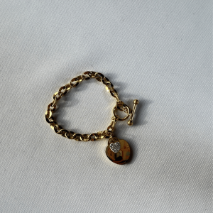 Brazalete en forma cadena con dije Corazón brillante | Dorado