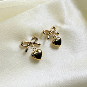 Aretes lazo corazón | Dorados